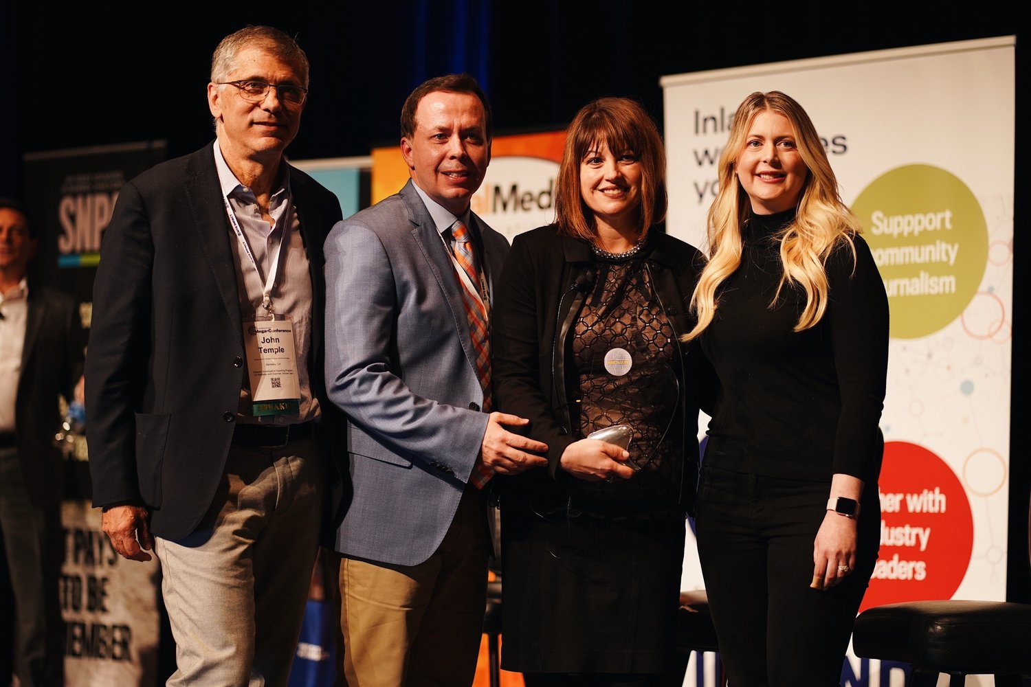 Pictured left to right: John Temple (one of the Mega-Innovation Award judges), and Jason Taylor, Rebecca Capparelli and Lyndsi Lane of GateHouse Live.